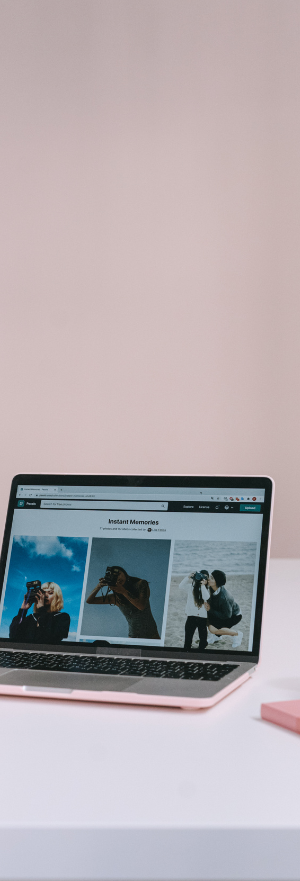 Laptop displaying a modern visual portfolio website