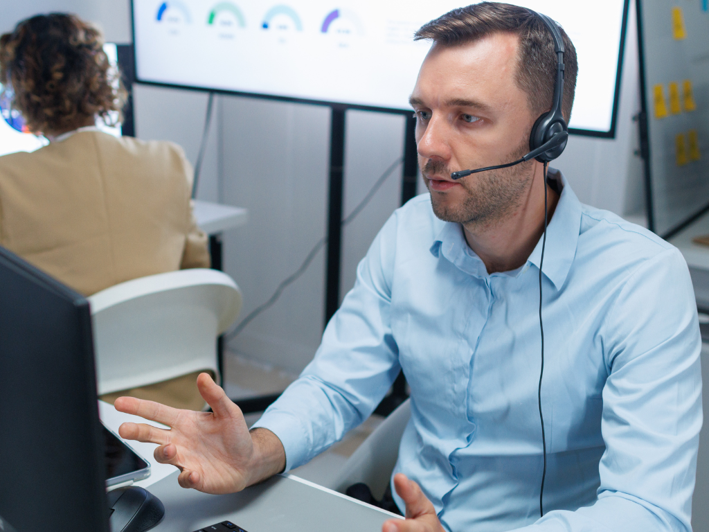 Professional service consultant speaking with a client online