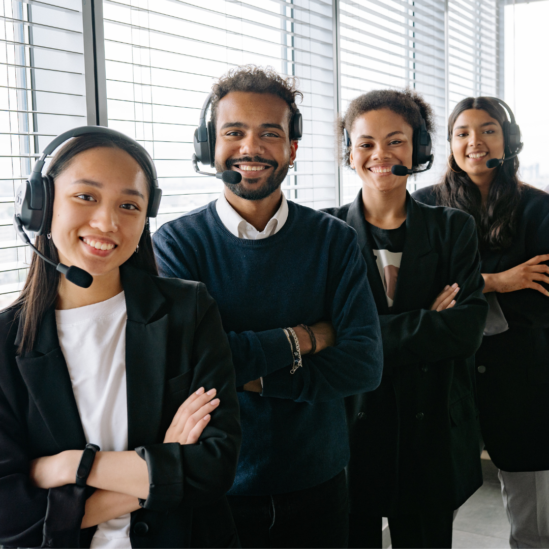 Service-based business team smiling in a professional office